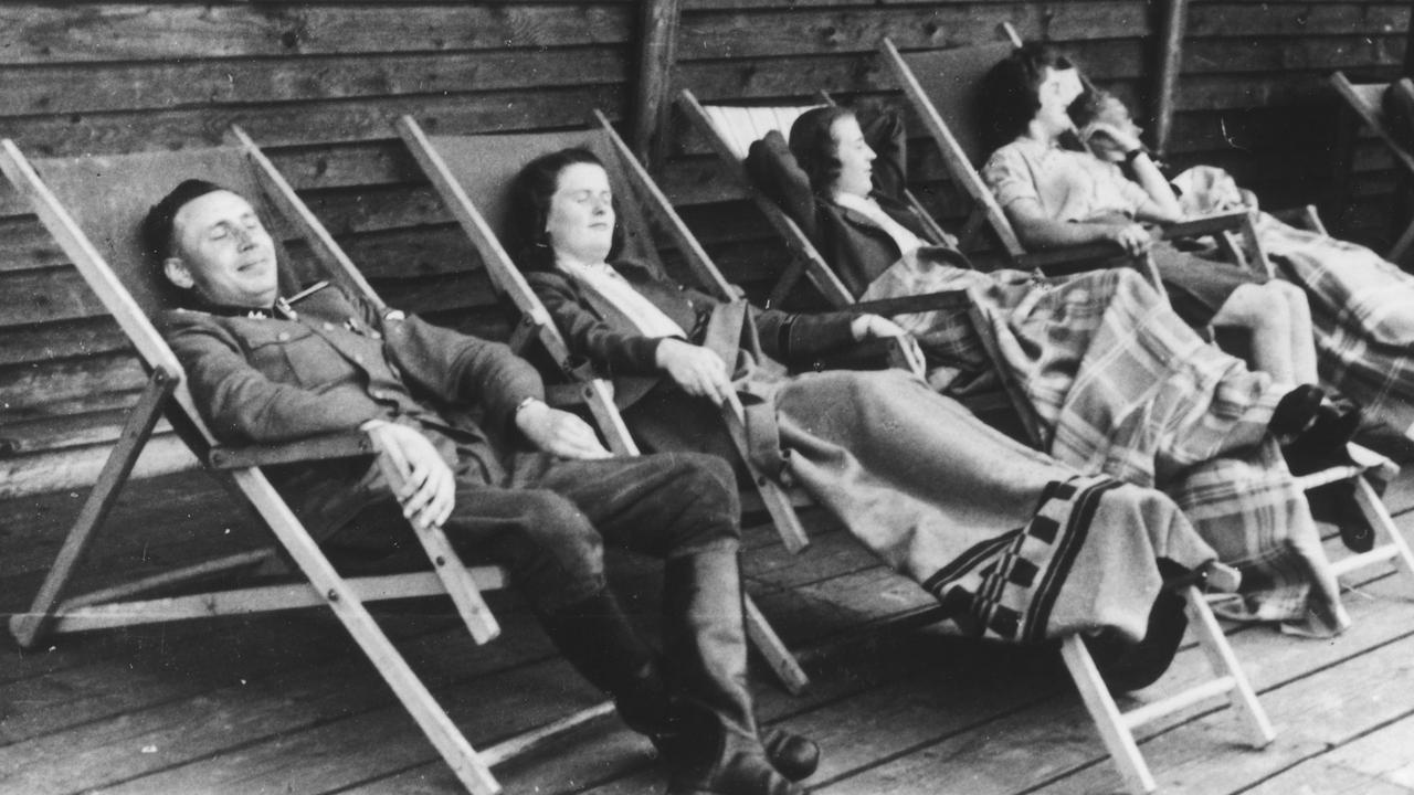 Nazis relax on lounge chairs on a deck at the resort. Picture: United States Holocaust Memorial Museum