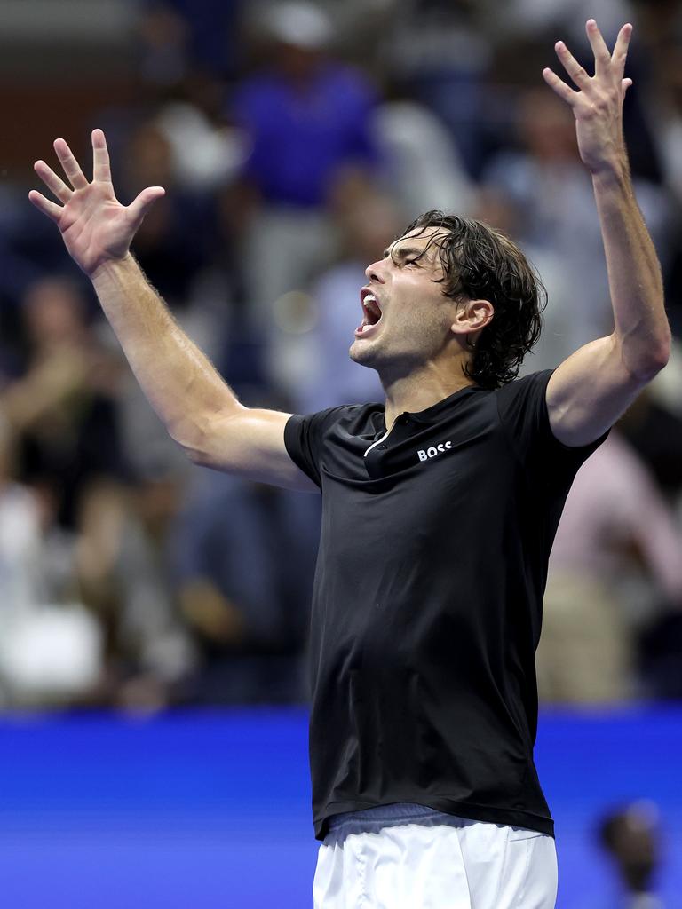 NEW YORK, NEW YORK - SEPTEMBER 06: Taylor Fritz of the United States celebrates after defeating Frances Tiafoe of the United States in their Men's Singles Semifinal match on Day Twelve of the 2024 US Open at USTA Billie Jean King National Tennis Center on September 06, 2024 in the Flushing neighborhood of the Queens borough of New York City. (Photo by Matthew Stockman/Getty Images)