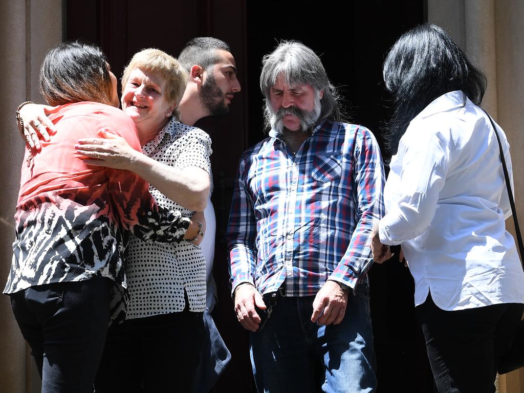 The parents of Cathrina Cahill, Rita Cahill (second from left) and Daniel Cahill (second from right) with supporters outside the Supreme Court, Sydney, Thursday, November 1, 2018. Picture: AAP /Dean Lewins.