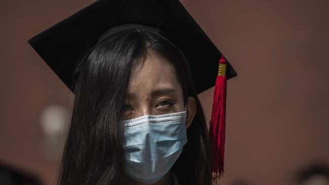 A Chinese student graduating in Beijing last month. Far fewer of them are going to the US to study.