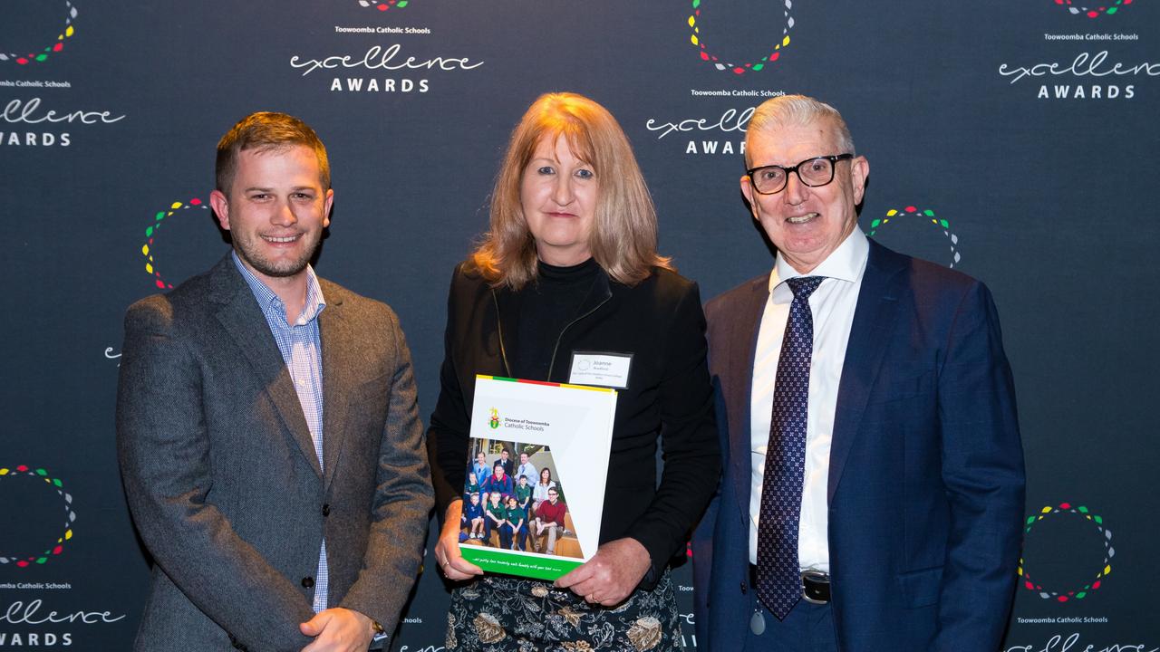 Award recipient Joanne Bradford (centre) with Mark McErvale from Aspect Architects and Dr Pat Coughlan.