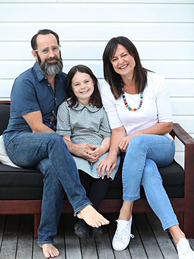 Mark Nielsen, Yvette Miller and daughter Harper Nielsen. The family have been inundated with attention over Harper’s controversial stance on the national anthem. Picture: Annette Dew