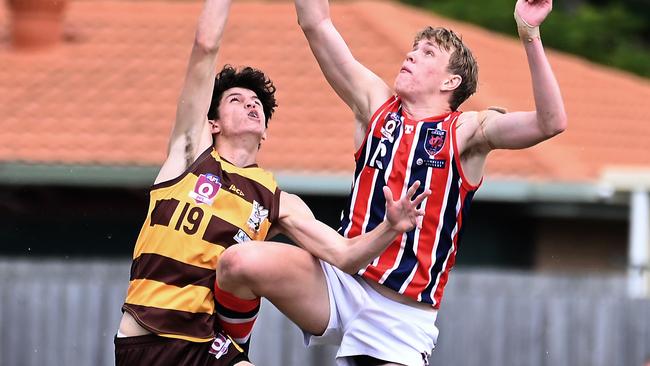 Aspley player Duncan Lewis and Wilston Grange player Marcus ZipfQAFL colts between Aspley and Wilston Grange. Saturday May 4, 2024. Picture, John Gass