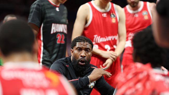 SYDNEY, AUSTRALIA - SEPTEMBER 29: Justin Tatum head coach of the Hawks talks to players during a time out during the round two NBL match between Sydney Kings and Illawarra Hawks at Qudos Bank Arena, on September 29, 2024, in Sydney, Australia. (Photo by Mark Metcalfe/Getty Images)