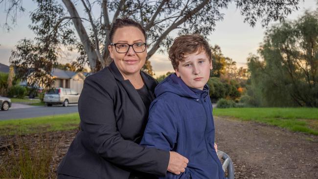 Rachel Mayne and son Liam, 10. Ms Mayne is among thousands of parents across the state who are set to be impacted by the strike. Picture: Ben Clark