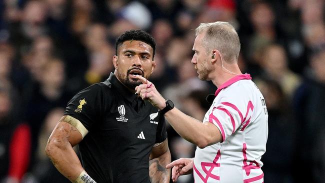 Referee Wayne Barnes speaks to New Zealand’s Ardie Savea during a fiery contest. Picture: Getty