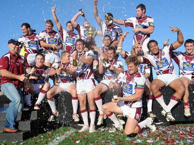 Sunshine Coast Sea Eagles celebrate a grand final win in 2009.