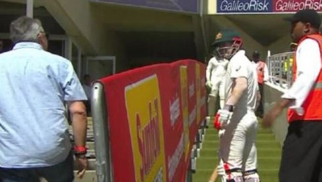 David Warner is confronted by a South Africa fan.