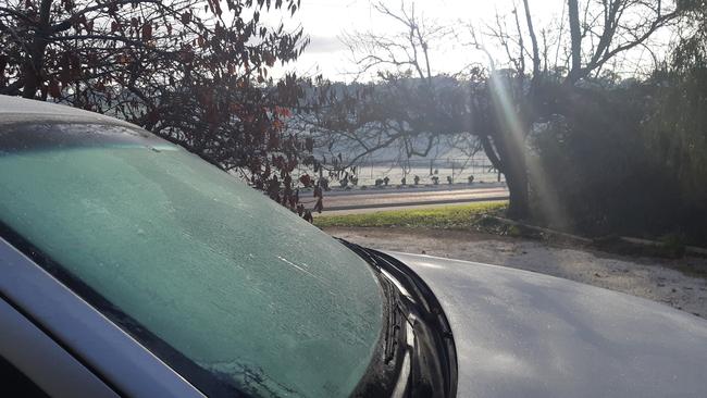 Cold weather leaves a frozen car windscreen in the Adelaide Hills.