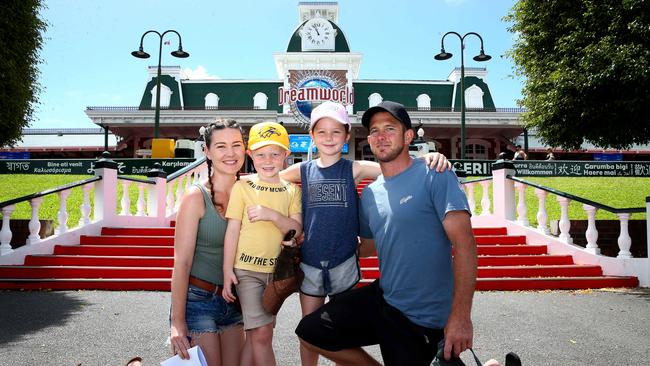 Ashlee Jones, Ryley Berry 6, Zoe Berry 8 and Tony Berry from Perth make a visit to Dreamworld on their holidays. Picture: Adam Head.