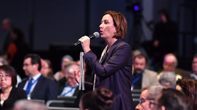 LNP Coast member Brooke Patterson debates a resolution at the Liberal National Party (LNP) state convention in Brisbane. (AAP Image/Darren England)