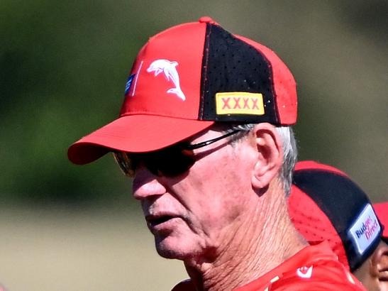 BRISBANE, AUSTRALIA - FEBRUARY 03: Coach Wayne Bennett talks to his players during a Dolphins NRL training session at Kayo Stadium on February 03, 2023 in Brisbane, Australia. (Photo by Bradley Kanaris/Getty Images)