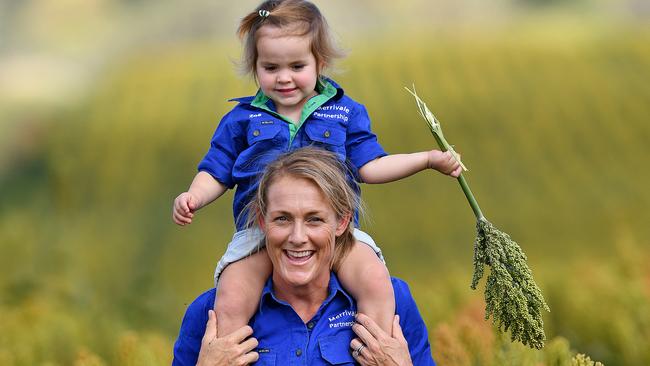 Farmer Kate Gunn of Pine Cliffs property Gunnedah NSW. Photographed in their Sorghum crop with her two year old daughter Zoe. Picture: Paul Matthews