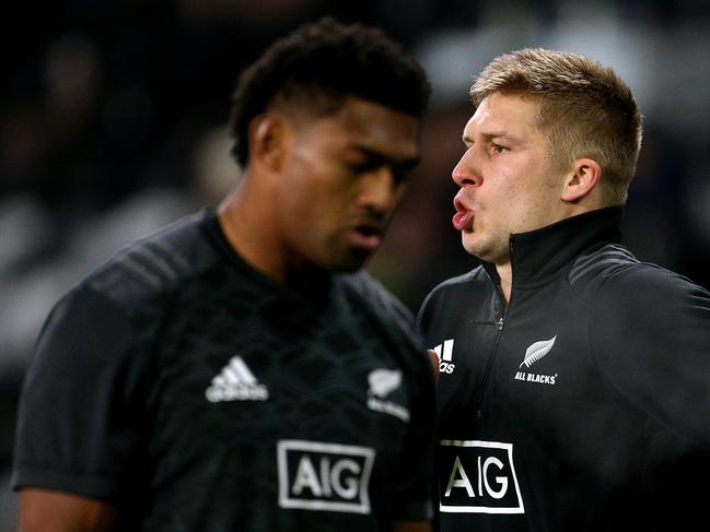 Waisake Naholo and Jack Goodhue of the All Blacks warm up.