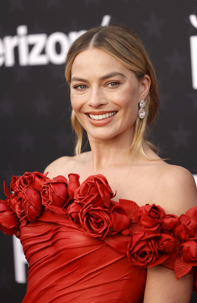 Margot Robbie donned another Barbie-inspired look for the Critics’ Choice: a custom red Balmain column dress referencing 1996’s Radiant Rose Barbie. Picture: Getty Images