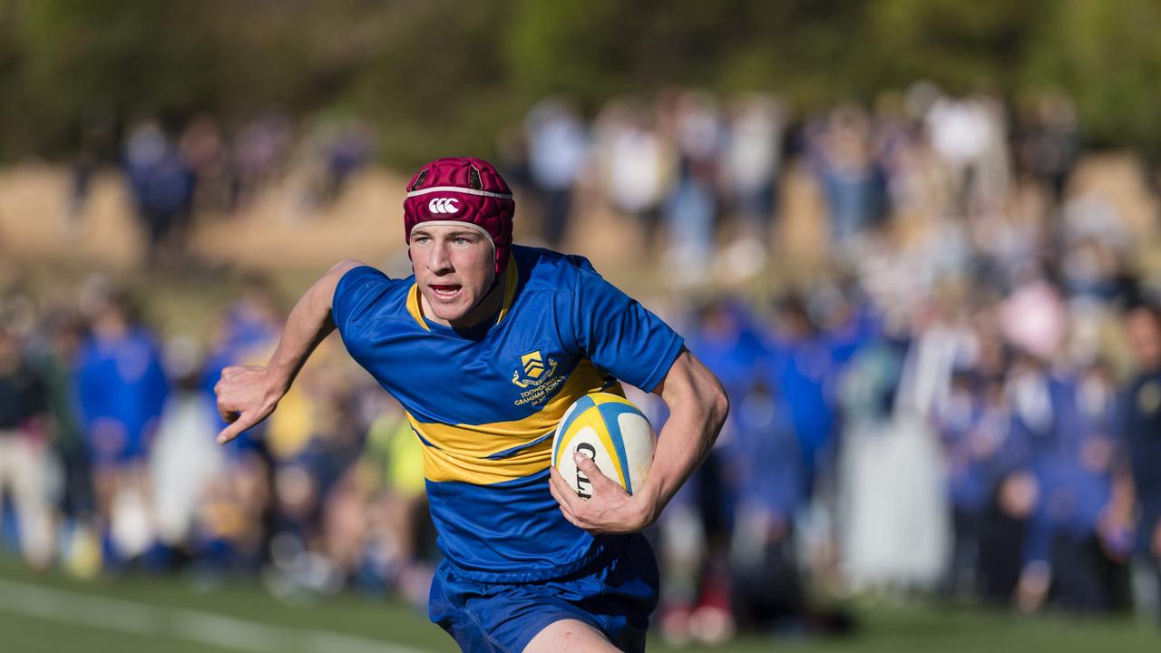 Harry Newnham on the way to score for Grammar against Downlands in the O'Callaghan Cup on Grammar Downlands Day at Toowoomba Grammar School, Saturday, August 19, 2023. Picture: Kevin Farmer