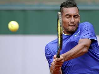 TITLE POTENTIAL: John McEnroe does not see Nick Kyrgios winning Wimbledon this year but he does believe the Aussie has the skills to win multiple grand slam titles. Picture: YOAN VALAT