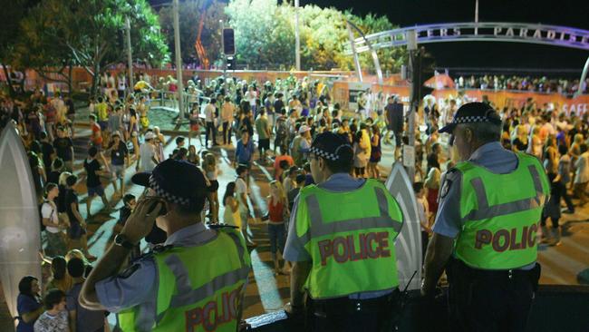 GOLD COAST, AUSTRALIA - NOVEMBER 23:  Police officers watch over the Schoolies week celebrations in Surfers Paradise on November 23, 2008 on the Gold Coast, Australia. Schoolies is the annual celebration by year 12 students following the culmination of their HSC exams. The celebrations happen in several official locations throughout Australia, but the Gold Coast kicks off the celebrations as the Queensland exams finish ahead of all other states.  (Photo by Sergio Dionisio/Getty Images)