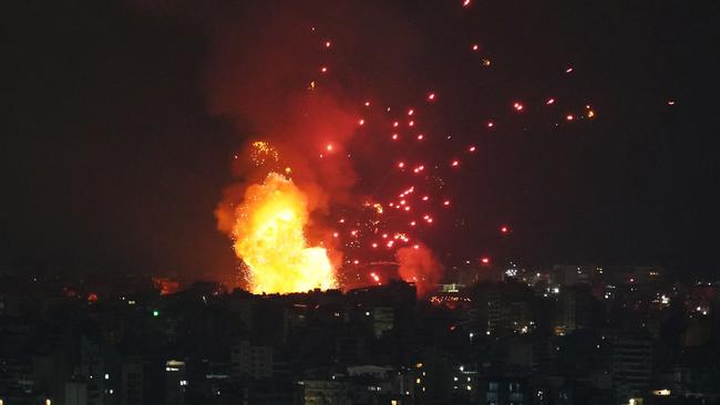 Fire and smoke rise at an area targeted by an Israeli airstrike on Beirut. Picture: AFP