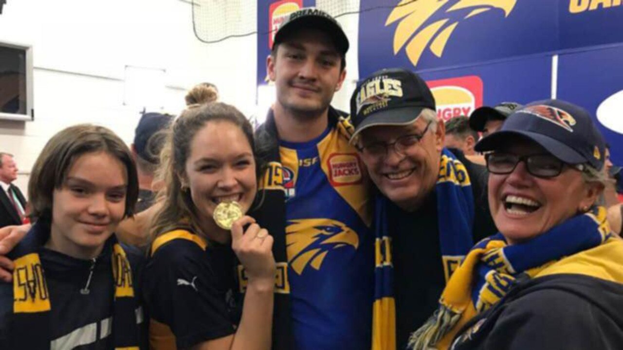 Tony Barrass and wife Danielle with their children Ted, Ally and Tom after the latter played in West Coast's 2018 AFL premiership. Picture: Danielle Benda (Facebook)