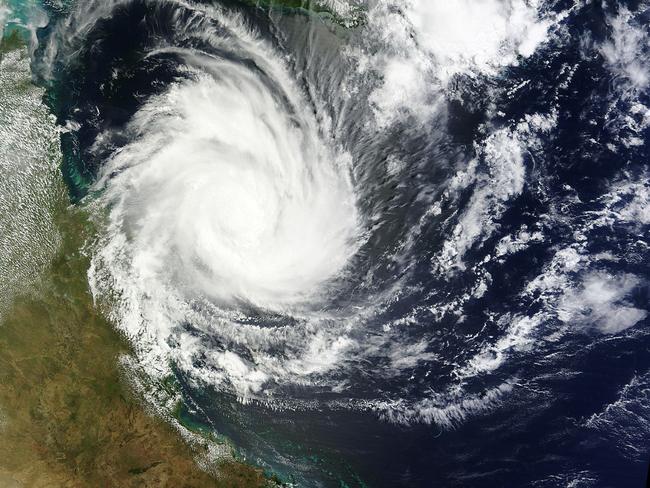 DANGER CLOSE: The latest satellite image of cyclone Nathan as it approaches Cape York. Is it expected to cross the coastline between Cape Melville and Cooktown as a category four system early tomorrow morning. IMAGE: NASA/MODIS