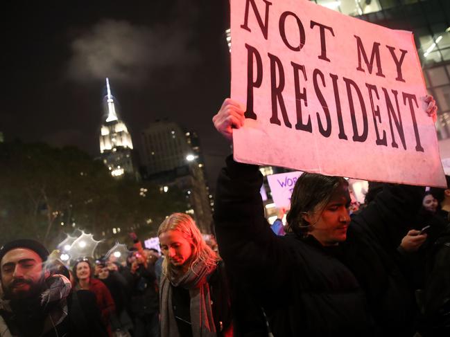 Hundreds of anti-Donald Trump protestors march through the street on 6th Avenue on their way to Trump Tower, November 9, 2016 in New York City. Picture: AFP