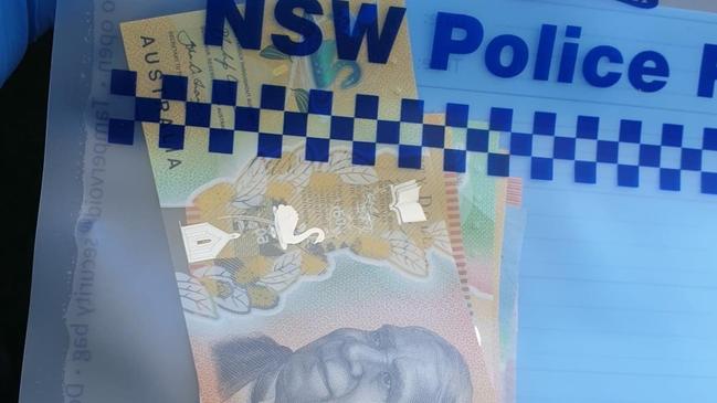 Strike Force Coifs detectives allegedly seized cash, drugs and prohibited weapons following raids at Windale.