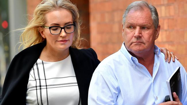 Emma Page-Campbell with her husband Robert Doyle in Flinders Lane. Picture: Nicole Garmston