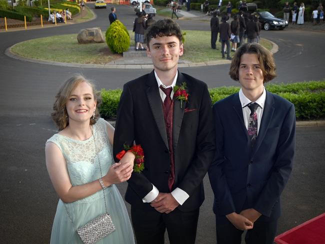Harristown High School formal 2020 at Highfields Cultural Centre. Carla Elliot with Aaron Ryan and Llyam Thorpe.