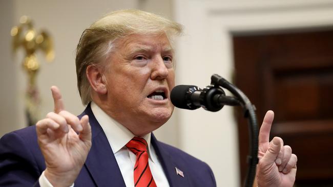 President Donald Trump responds to a question from a reporter. Picture: Getty