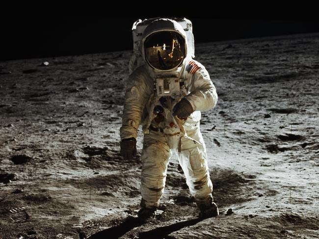 Apollo 11 astronaut Buzz Aldrin walks on the surface of the Moon at Tranquility Base. (Photo by Â© CORBIS/Corbis via Getty Images)