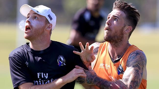 Collingwood star Dane Swan, right, has signed a two-year contract extension. Picture: Wayne Ludbey