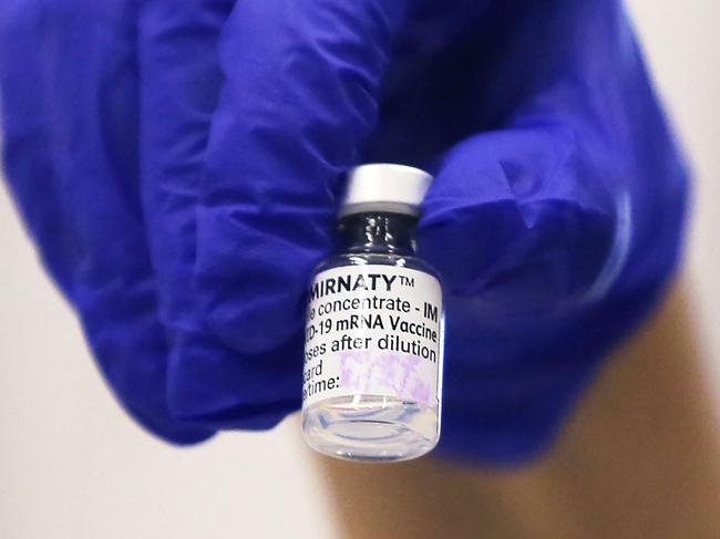 A vial of the Pfizer/BioNTech Covid-19 vaccine is seen ahead of the first rollout of vaccinations at the Castle Hill Medical Centre in Sydney on February 21, 2021. (Photo by STEVEN SAPHORE / AFP)