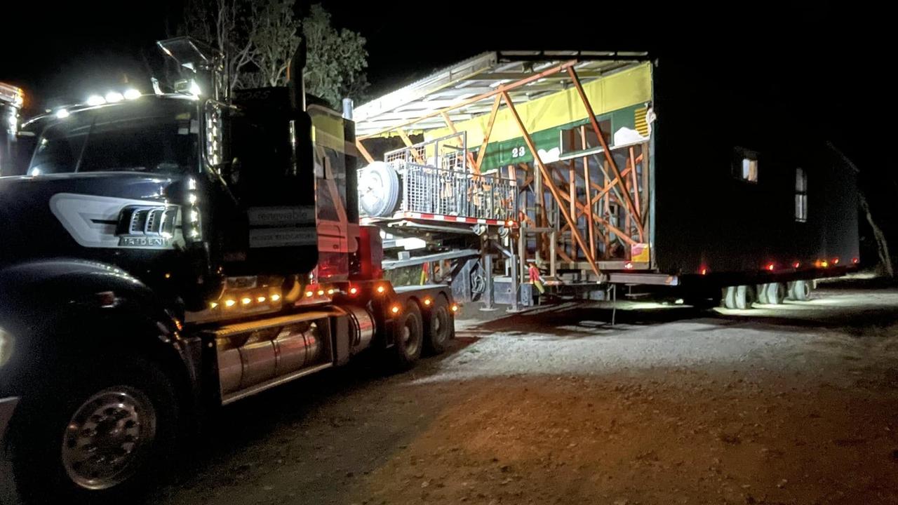 Jo Veneman's truck with an old Bowen house onboard prepares to cross the Burdekin bridge