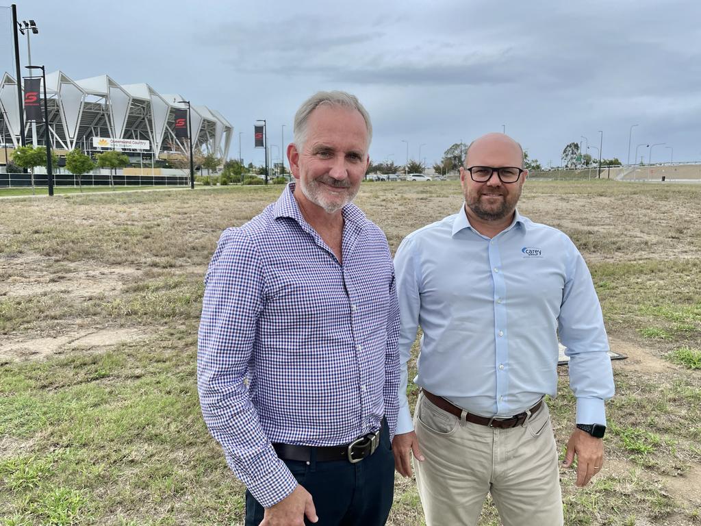 HHNQ director Michael Graham and Carey Group chief executive Matt Thomson at the site of the future Hilton Garden Inn, next to Queensland Country Bank Stadium. Picture: Leighton Smith.