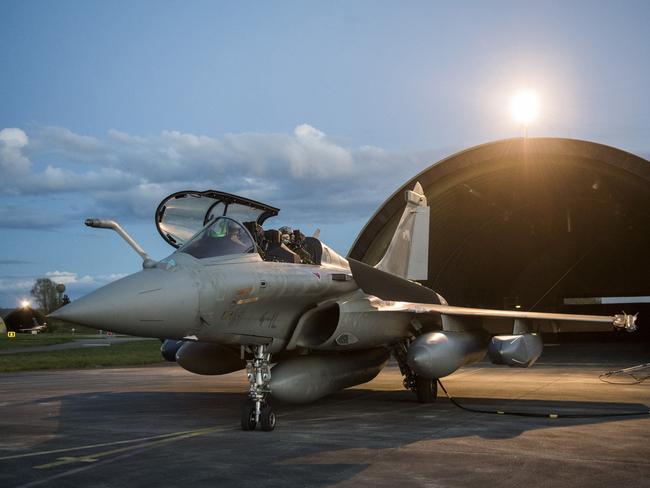 A Dassault Rafale fighter aircraft is prepared for air strikes in Syria at Saint Dizier air base, eastern France. Picture: French Defense Ministry/ECPAD via AP