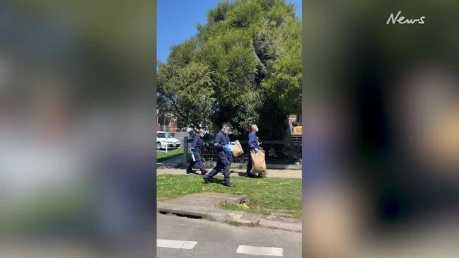 Forensic officers gather evidence in Daylesford