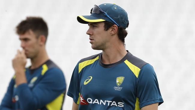 Travis Head (right) makes way for Mitchell Marsh (left) in tonight’s Fifth Test at The Oval. Picture: Getty Images