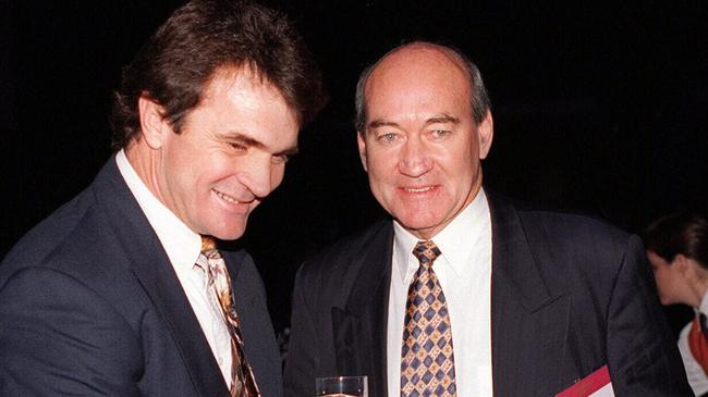 Super League chief executive John Ribot (L) shakes hands with ARL chief executive John Quayle before Super League debate at Brisbane Convention Centre. Pic Ex Brisbane 26/05/95 Sport / Rugby League / With Others