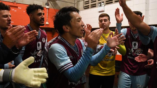 Tasuku Sekiya celebrates Tuesday night’s famous FFA Cup win over Melbourne Victory with APIA Leichhardt teammates. Picture: AAP