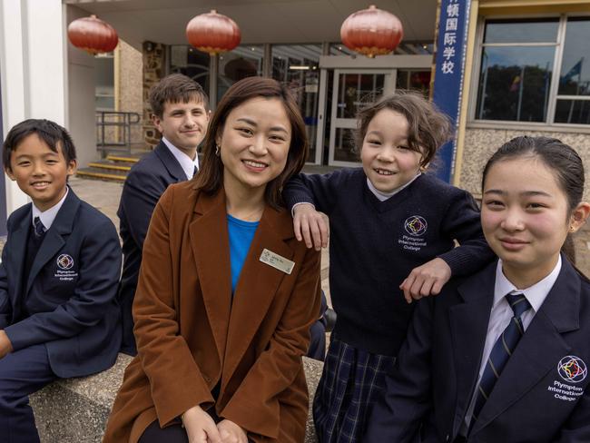 20 June, 2023: Jenny Xu -  Bilingual program coordinator with students Ethan Taing, Keith longworthl, Madelyn Cormack and Jiayu Lin. Plympton International College has turned itself around really turned especially with its bilingual Chinese program. Picture: Kelly Barnes