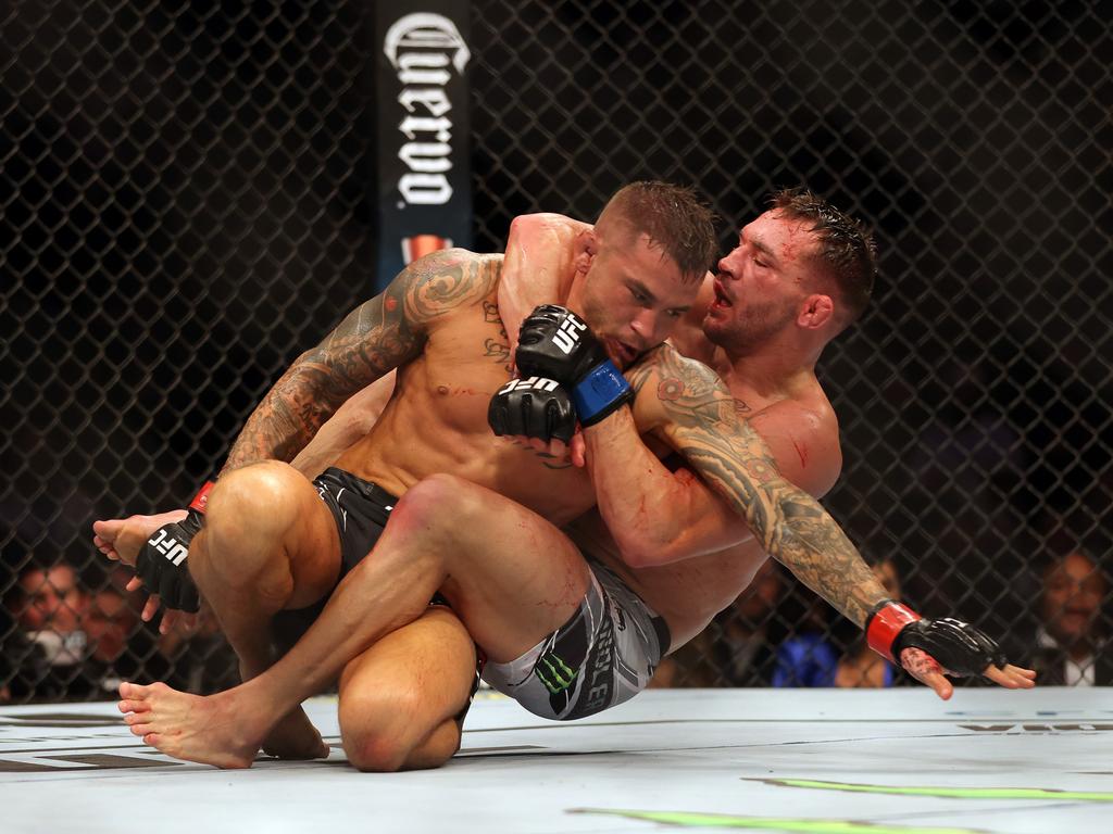 Dustin Poirier battles Michael Chandler during their Lightweight fight at UFC 281.