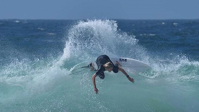 Noosa surfer Tim Bain tearing the top off a solid peak with style.