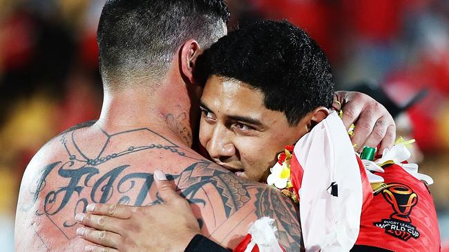 Andrew Fifita and Jason Taumalolo of Tonga embrace after losing the 2017 Rugby League World Cup semi final.