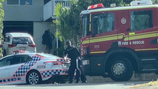 Police at a Beenleigh street where a truck hit a pedestrian this morning.