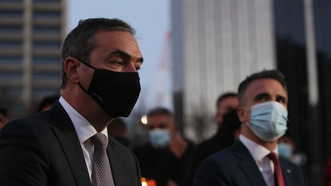 Premier Steven Marshall and Labor Leader Peter Malinauskas at a candle light vigil in Victoria Square in August to show solidarity with the people of Afghanistan. Picture: Emma Brasier