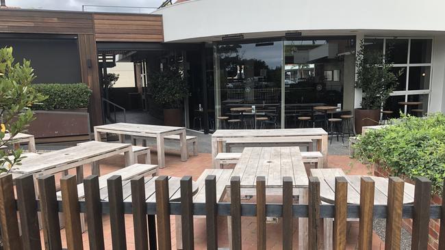 An empty beer garden at Rosebud Hotel.