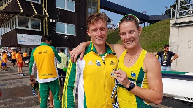 Gold Coast kayak athletes Jordan Wood and wife Alyce Burnett with their gold medals won five years apart at the World Championships. Picture: SUPPLIED