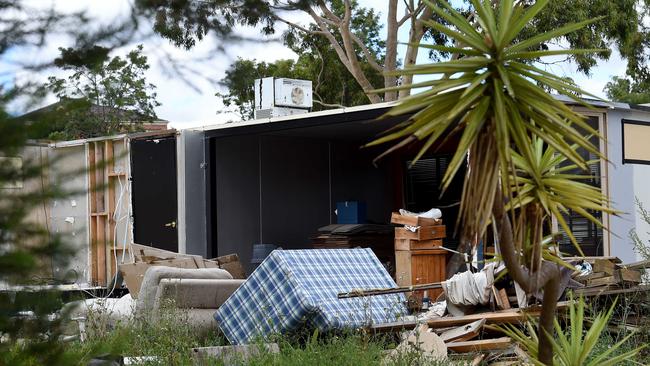 Upturned furniture is among the belongings left behind.