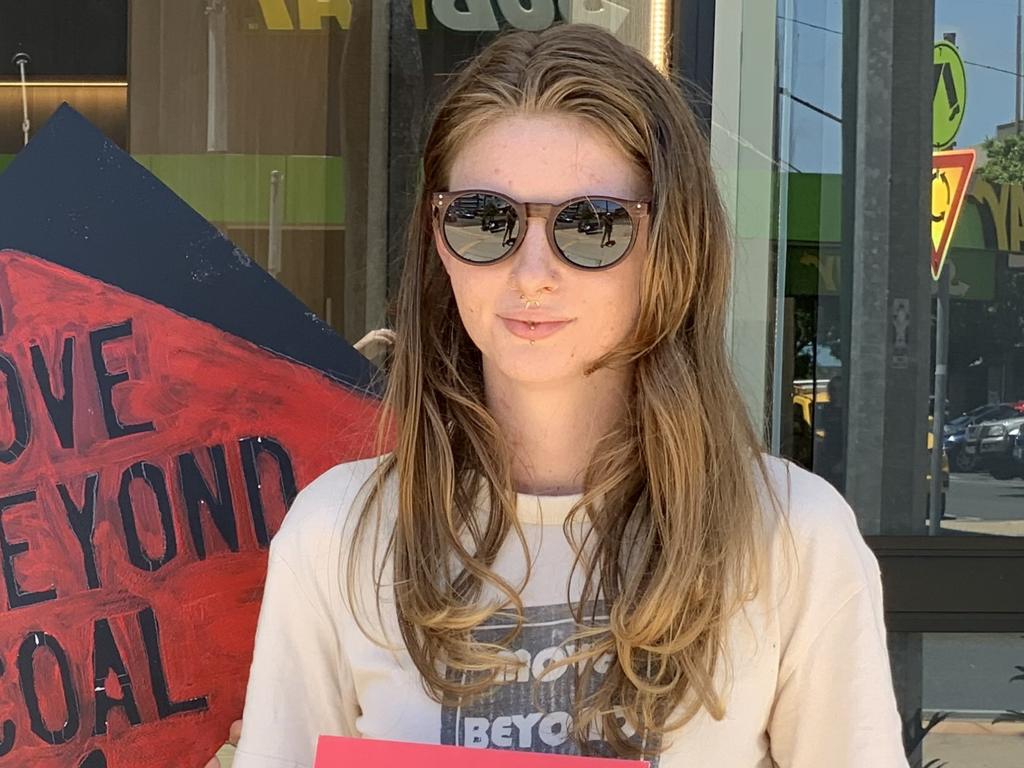 Move Beyond Coal campaigner Imogen Lindenberg outside the NAB branch in Mackay on November 11, 2022. Picture: Duncan Evans